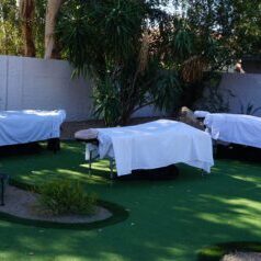 3 massage tables set up outside for a group massages at Airbnb in Scottsdale